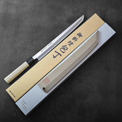 Sakimaru sujihiki with saya and beige box featuring black kanji lettering, blade length approximately 300mm.