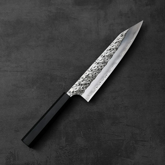 Yoshimi Kato Hyo SG2 kiritsuke gyuto 210mm with a black handle is shown, highlighting its distinct shape and handle color.