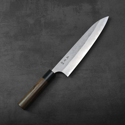 Yoshimi Kato nashiji AS gyuto 210mm with a wooden handle featuring a textured pattern along the blade.