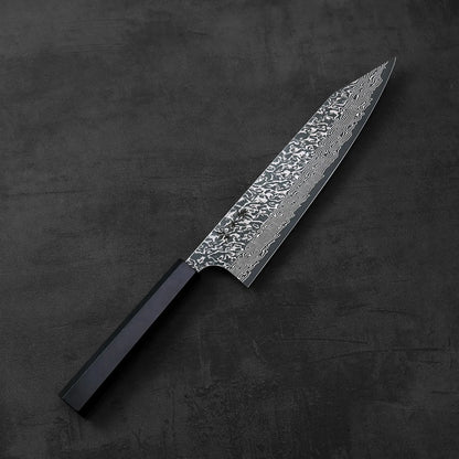 Yoshimi Kato VG10 damascus kiritsuke gyuto 210mm with a black handle, blade featuring damascus pattern.