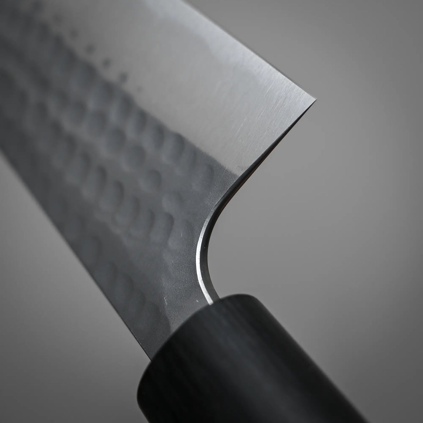 Close-up shot of the choil of 170mm Anryu knife tsuchime aogami#2 santoku