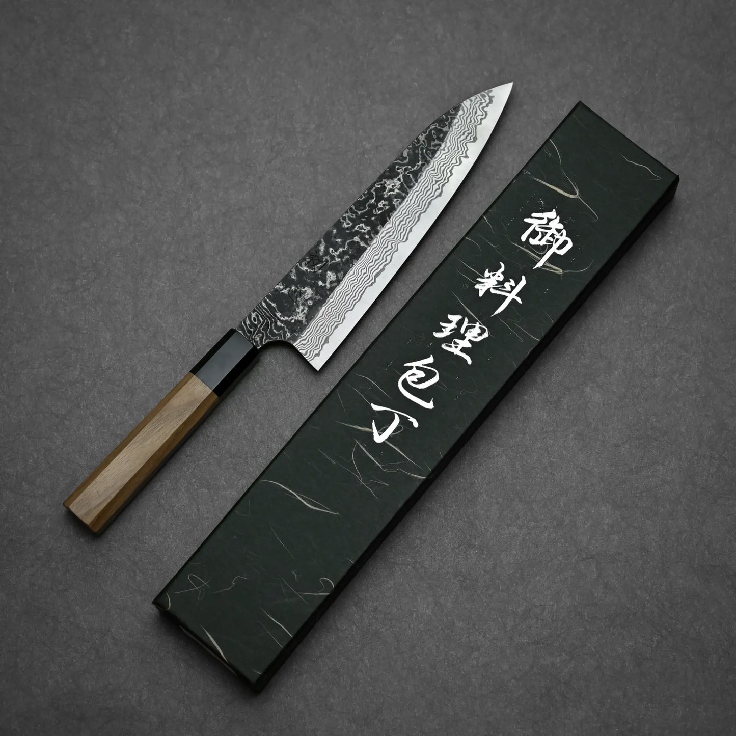 Nigara knife SLD kurouchi damascus 210mm gyuto capturing full blade dimensions with its box