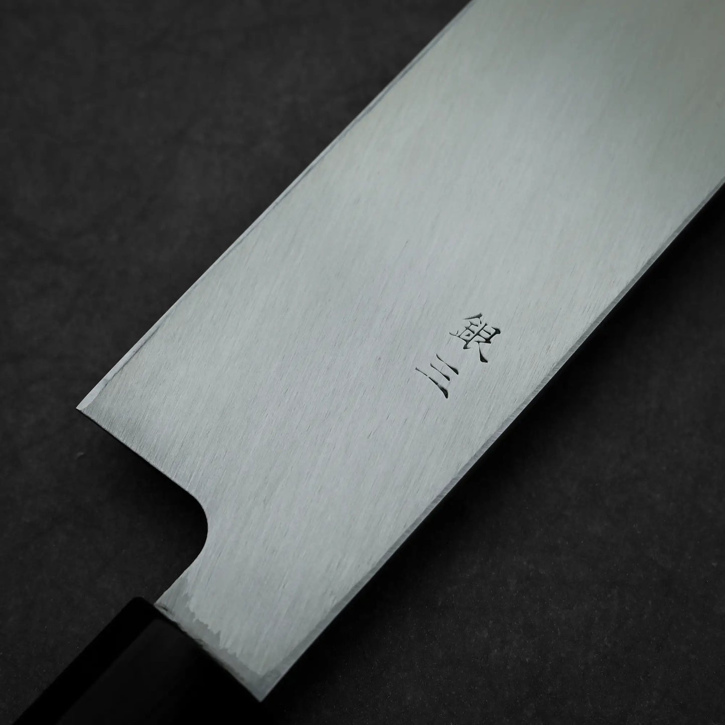 Close-up shot of the kanji on the back side of 300mm Hatsukokoro Shirasagi ginsan yanagiba knife