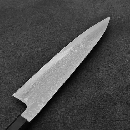 Close up view of the back side of Hatsukokoro Komorebi damascus aogami#1 gyuto knife