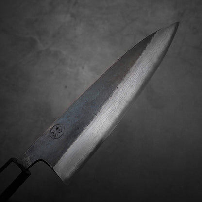Top view of the blade of Hatsukokoro Kumokage gyuto knife. Image focuses on the right side of the blade.