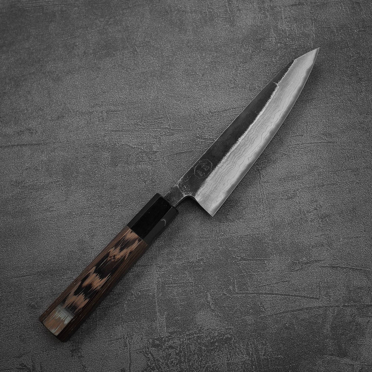 Top down view of Hatsukokoro Kumokage kurouchi damascus aogami#2 honesuki knife