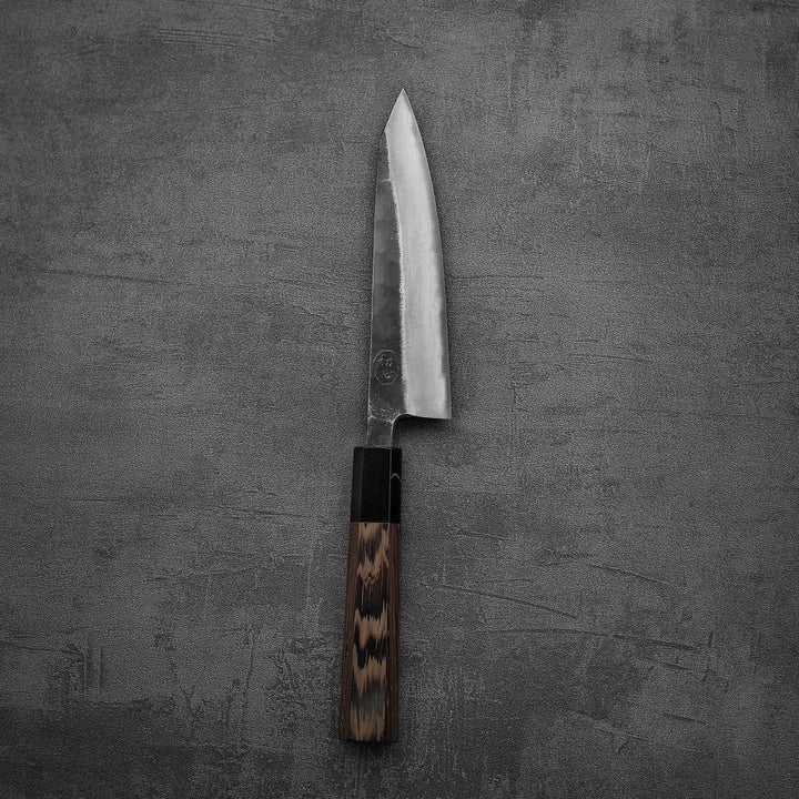 Top down view of Hatsukokoro Kumokage kurouchi damascus aogami#2 honesuki knife