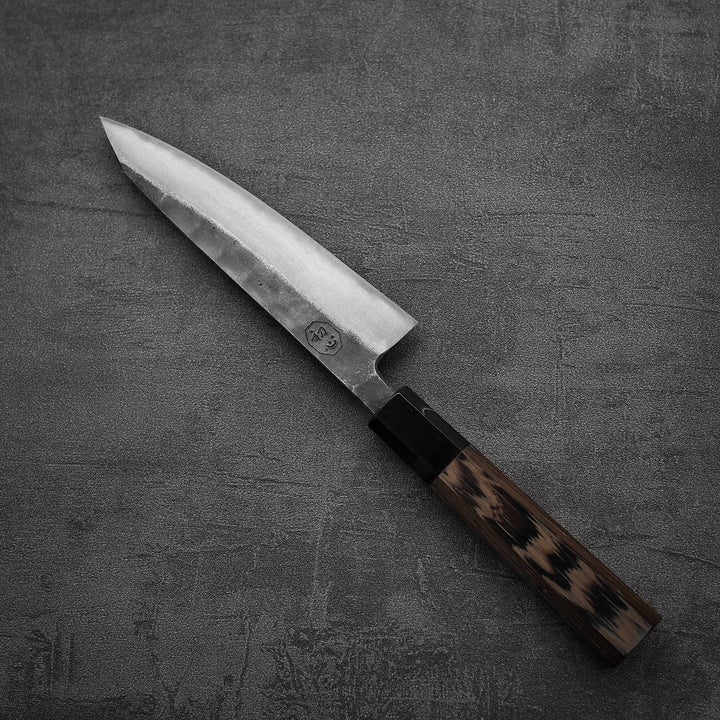 Top down view of Hatsukokoro Kumokage kurouchi damascus aogami#2 honesuki knife