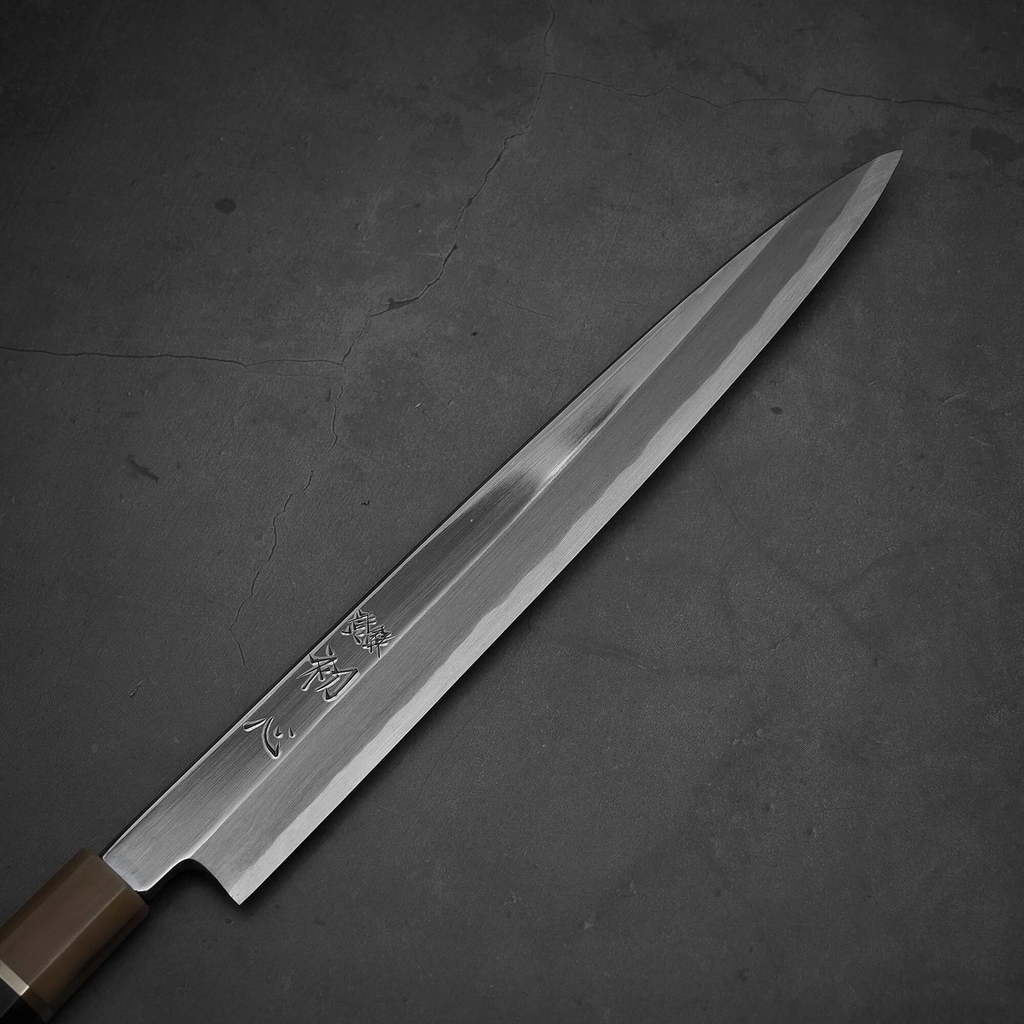 Close up view of Nakagawa yanagiba with aogami#1 steel. This sushi knife is sharpened by Morihiro hamono. 