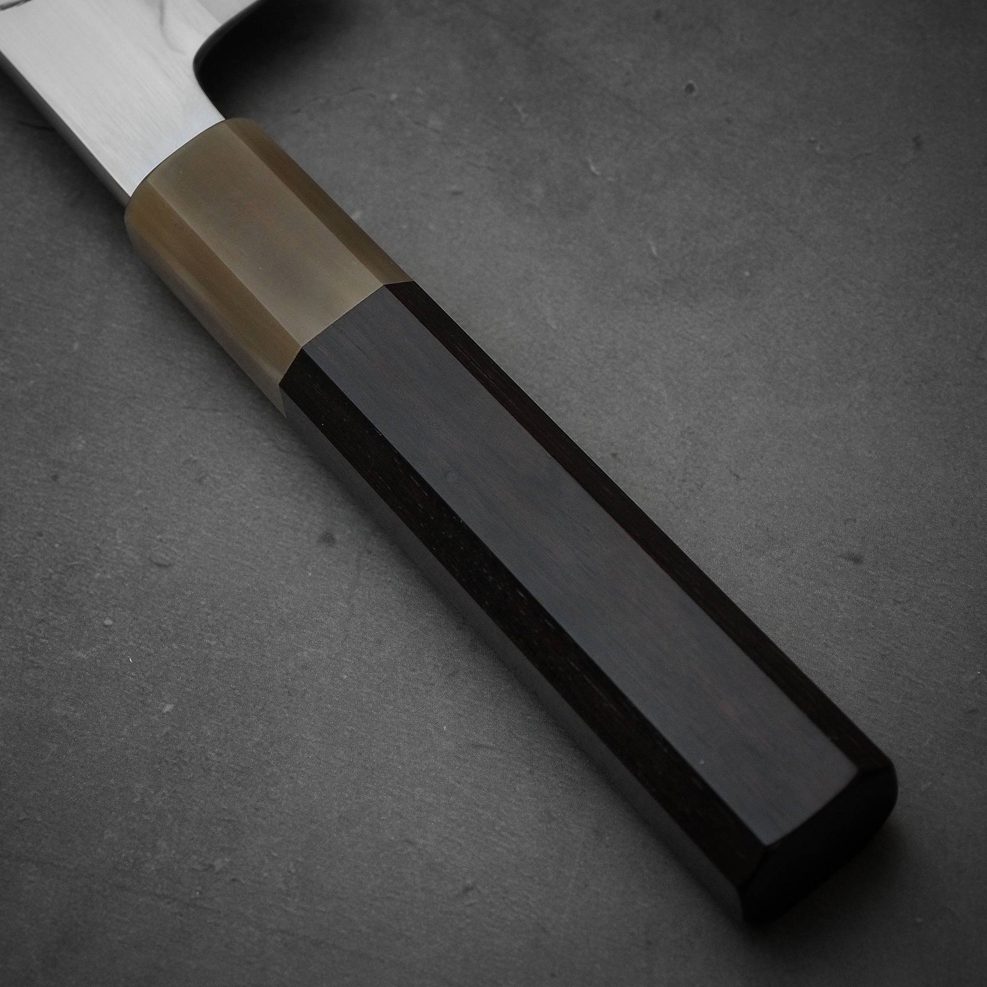 Close up view of the handle of  Nakagawa shirogami#3 honyaki bunka. This Japanese knife is sharpened by Morihiro hamono. 