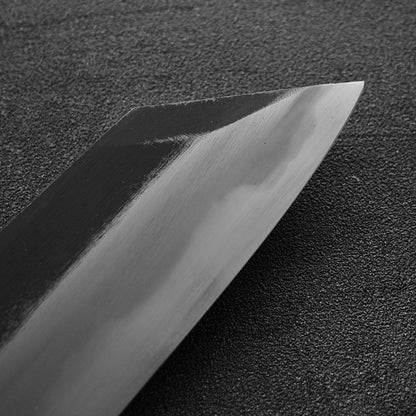 Close up view of the tip area of Hatsukokoro Yoake kurouchi aogami#1 kiritsuke gyuto knife