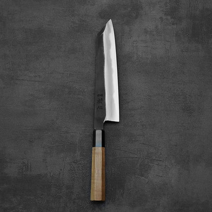 Top down view of Hatsukokoro Yoake kurouchi aogami#1 kiritsuke gyuto knife