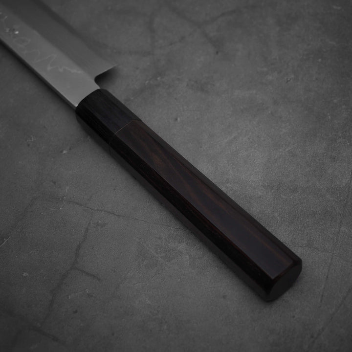 Top view of the octagonal ebony handle of Hideo Kitaoka damascus shirogami#2 yanagiba 270mm