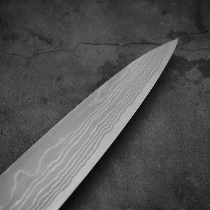 Close up view around the tip of Hideo Kitaoka damascus shirogami#2 yanagiba 270mm