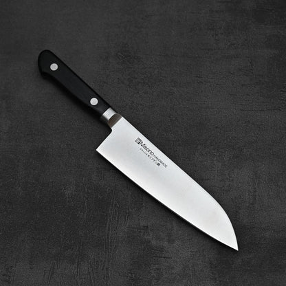 Top down view of Misono Molybdenum santoku knife 180mm where tip is pointing towards lower right