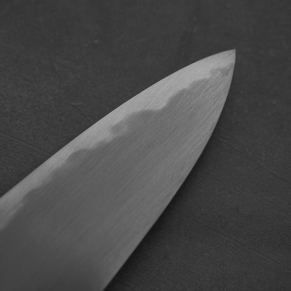 Close up view of the tip area of Nakagawa aogami#2 gyuto knife. Image shows the left side of the blade.
