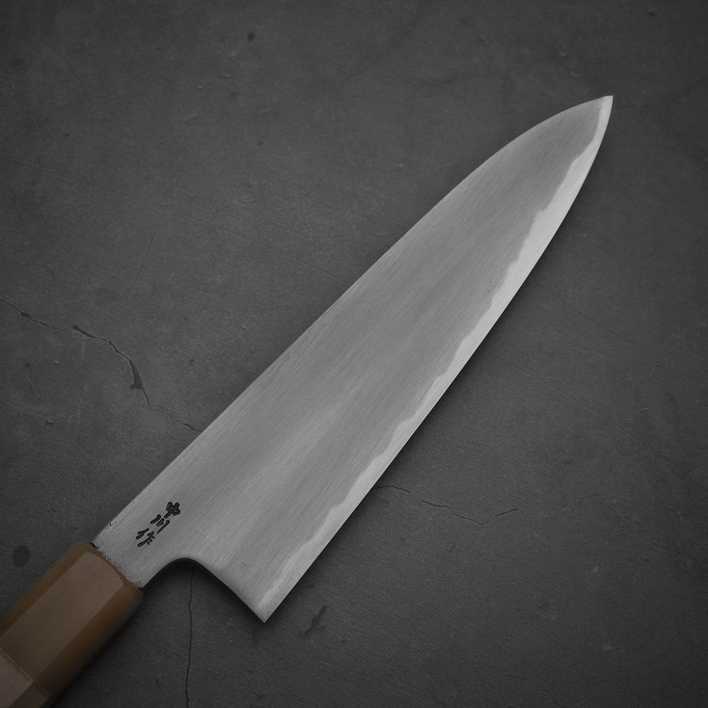 Top view of the blade of Nakagawa aogami#2 gyuto knife. Image shows the right side of the blade.