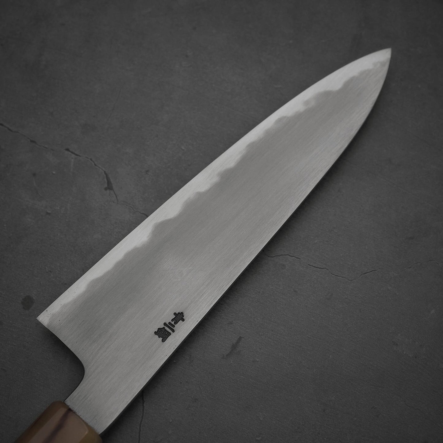 Top view of the left side of the blade of Nakagawa aogami#2 gyuto knife