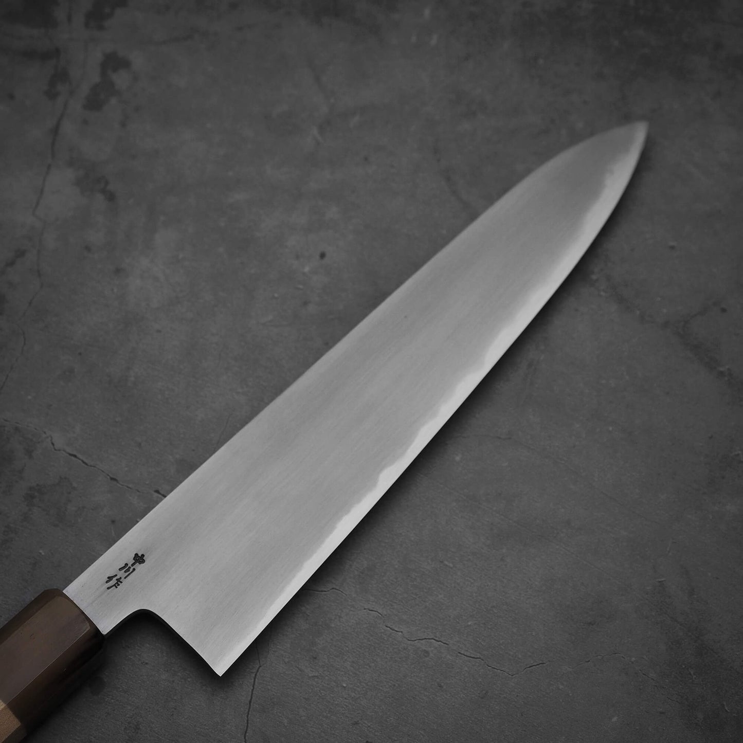 Top view of the blade of the Nakagawa aogami#2 gyuto. Image shows the right side of the blade.