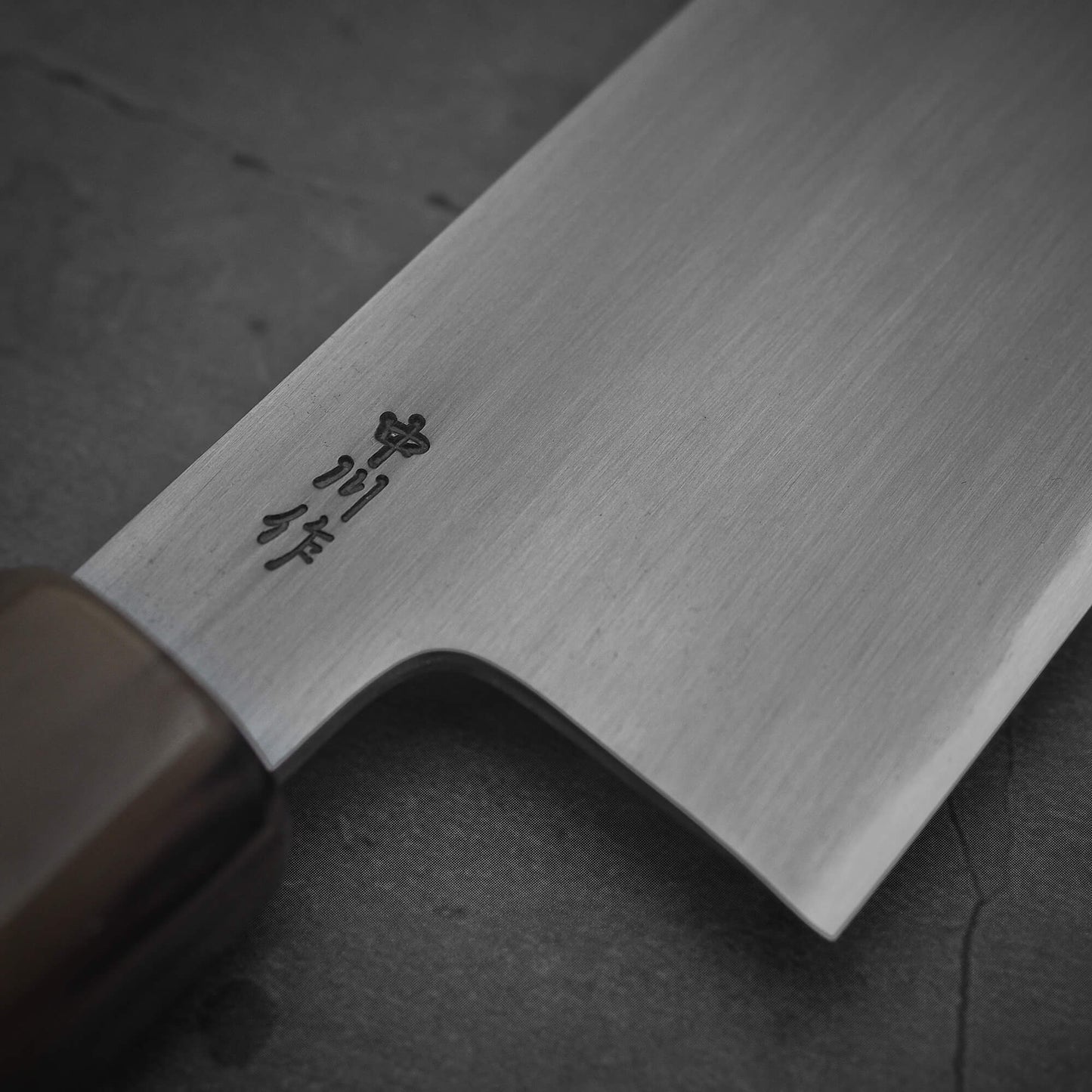 Close up view of the kanji side of the Nakagawa aogami#2 gyuto