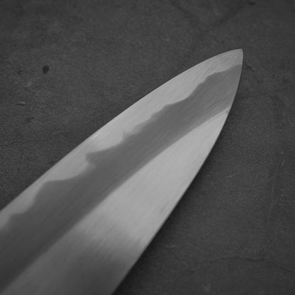 Close up view of the tip area of Nakagawa shinogi aogami#2 gyuto knife