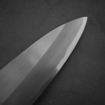 Close up view of the tip area of the Nakagawa shinogi aogami#2 gyuto knife. Image shows the right side