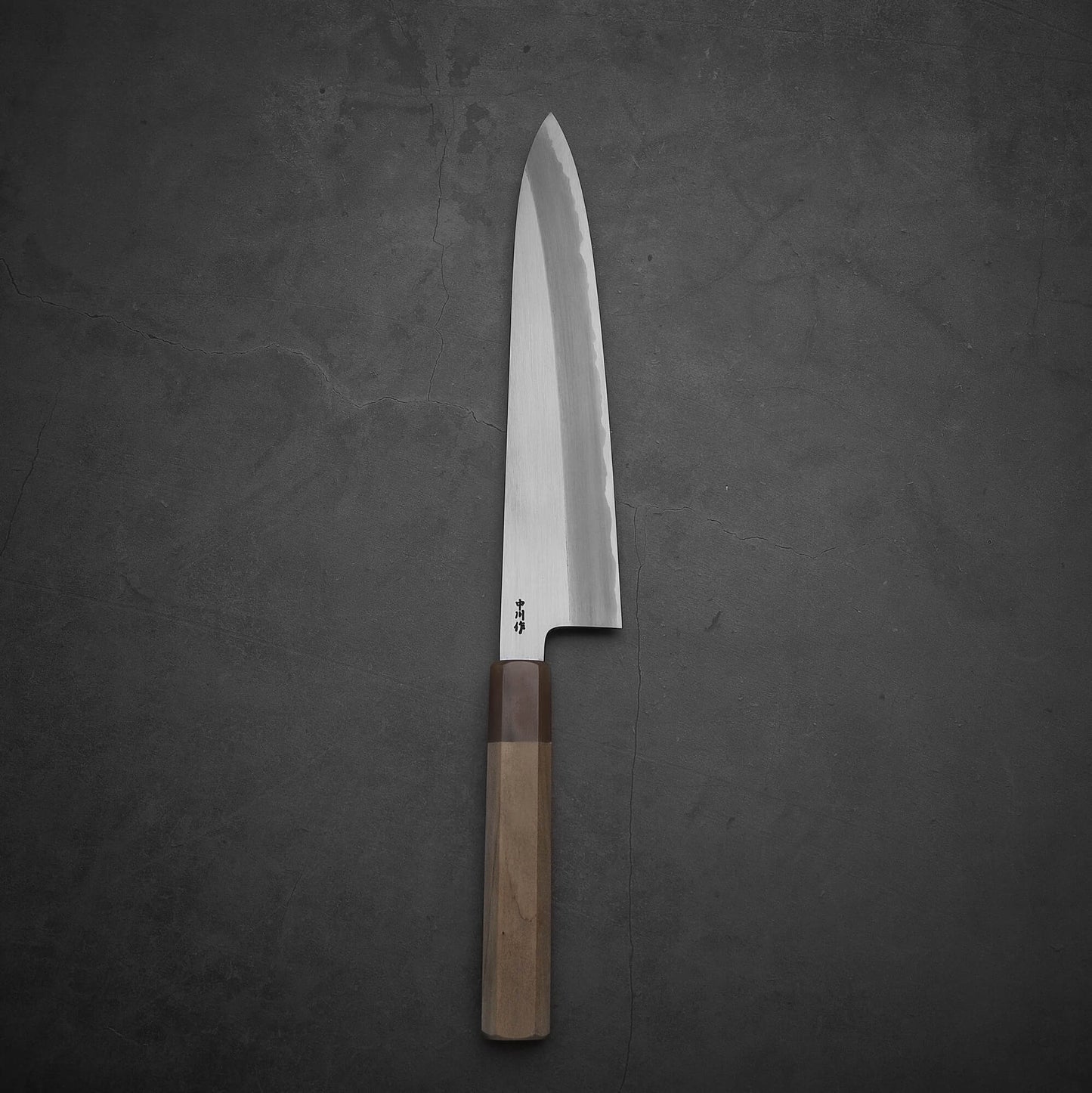 Top view of Nakagawa shinogi aogami#2 gyuto knife in vertical position