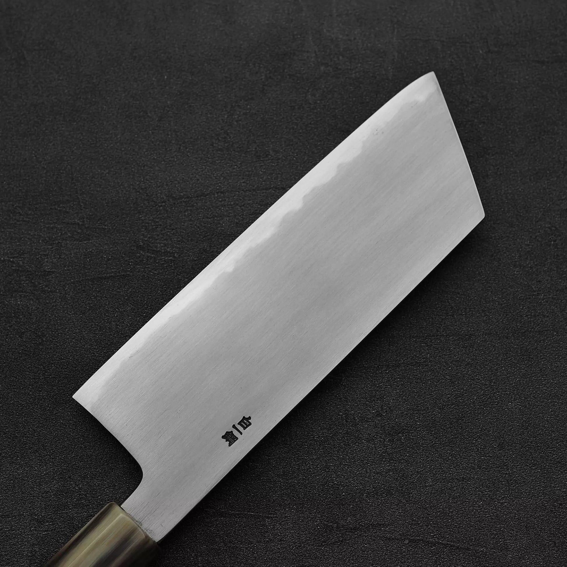 Close up of the back side of Nakagawa bokashi shirogami#1 ktip nakiri knife