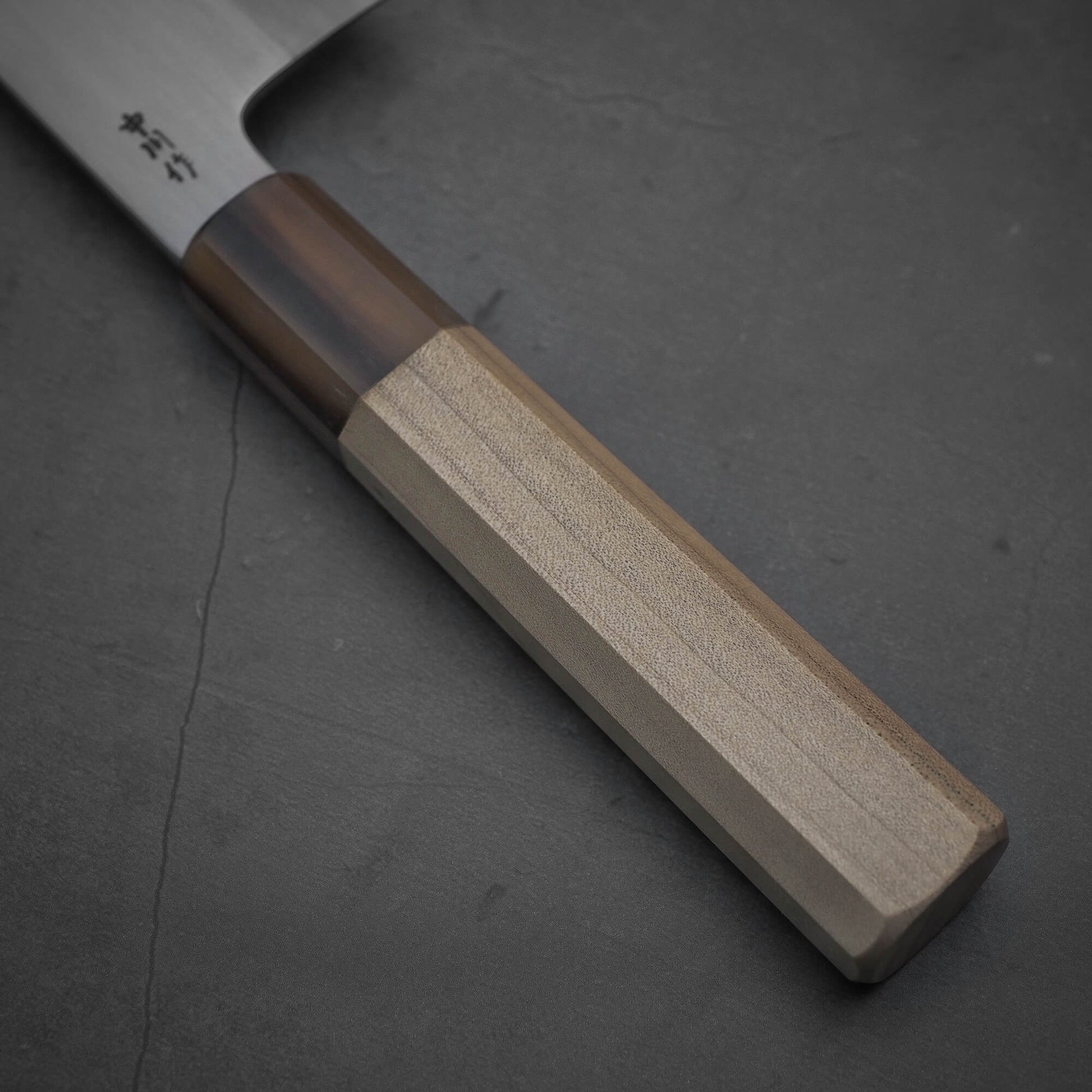 Close up view of the handle of Nakagawa shinogi aogami#2 nakiri knife