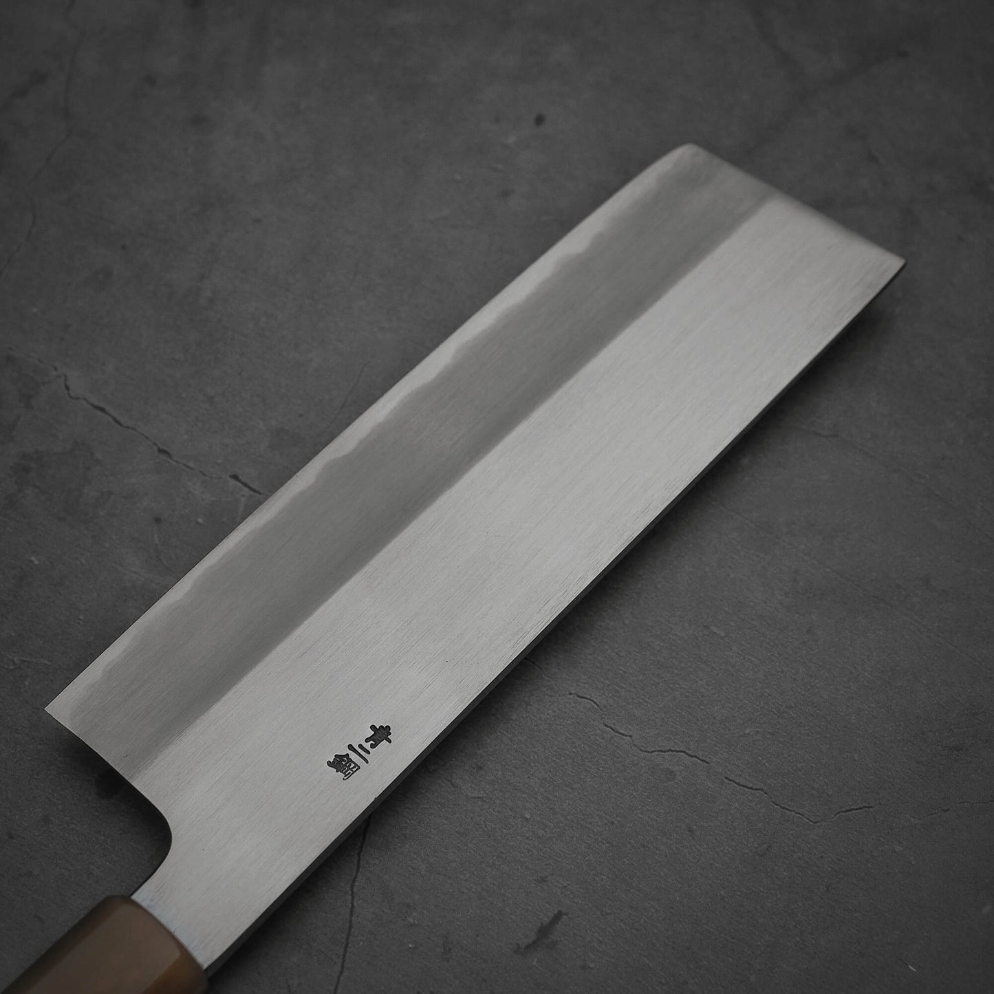 Top view of the left-side blade of Nakagawa shinogi aogami#2 nakiri knife