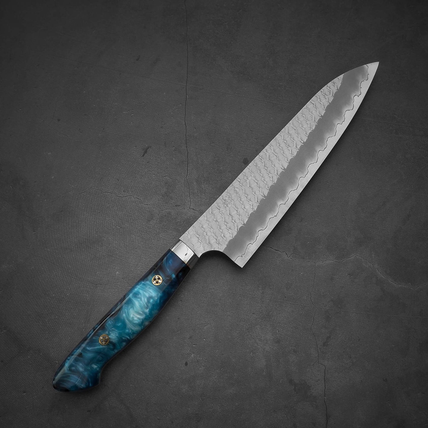 Top view of 210mm Nigara tsuchime SG2 gyuto knife with blue handle