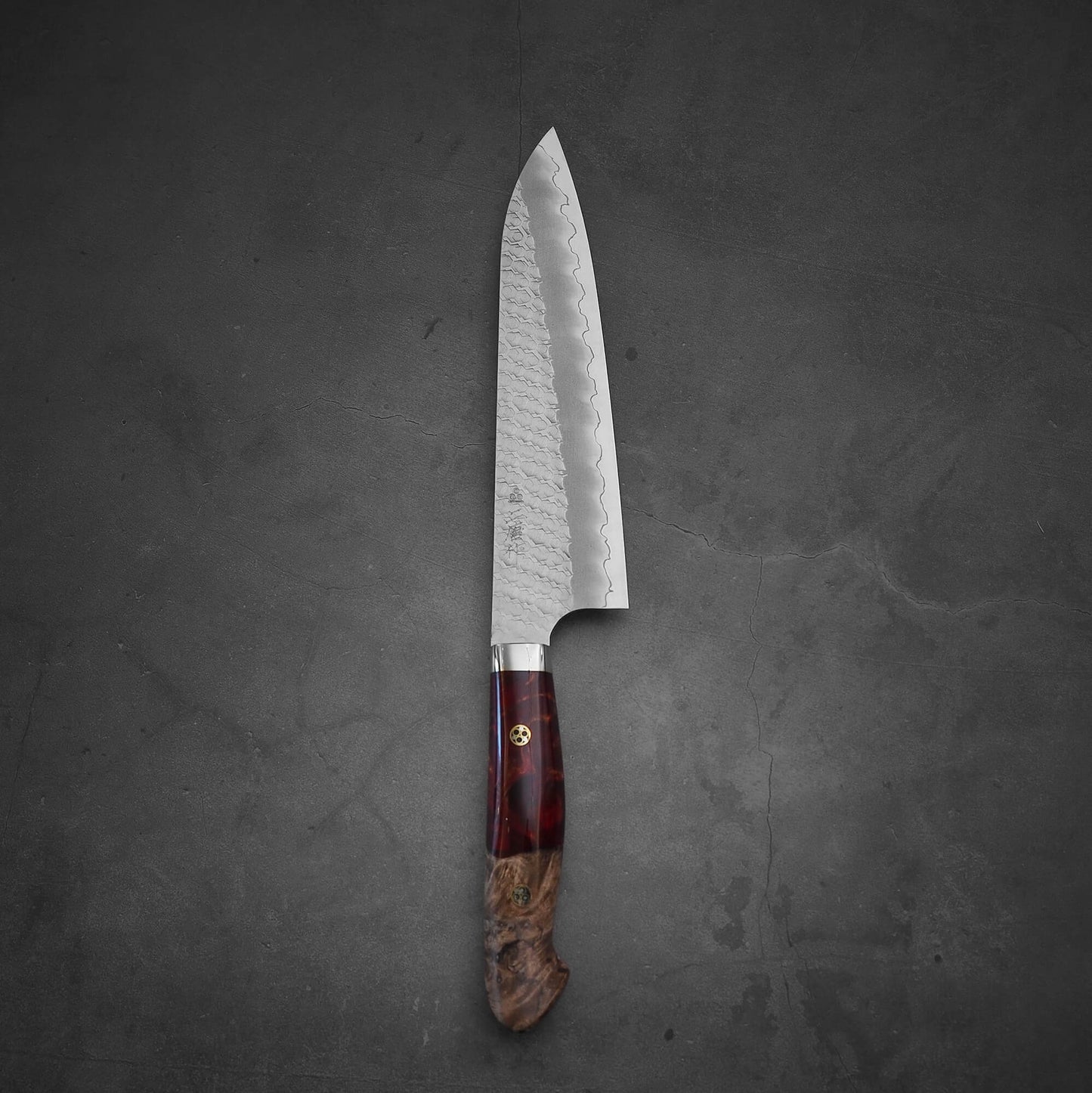 Top view of 210mm Nigara tsuchime SG2 gyuto knife with red handle