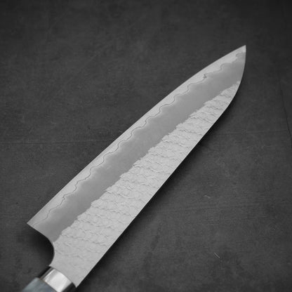 Back side view of 210mm Nigara tsuchime SG2 gyuto knife with pearl handle resin