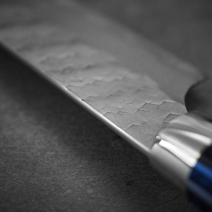 Close up view of the spine of Nigara tsuchime SG2 petty knife 150mm