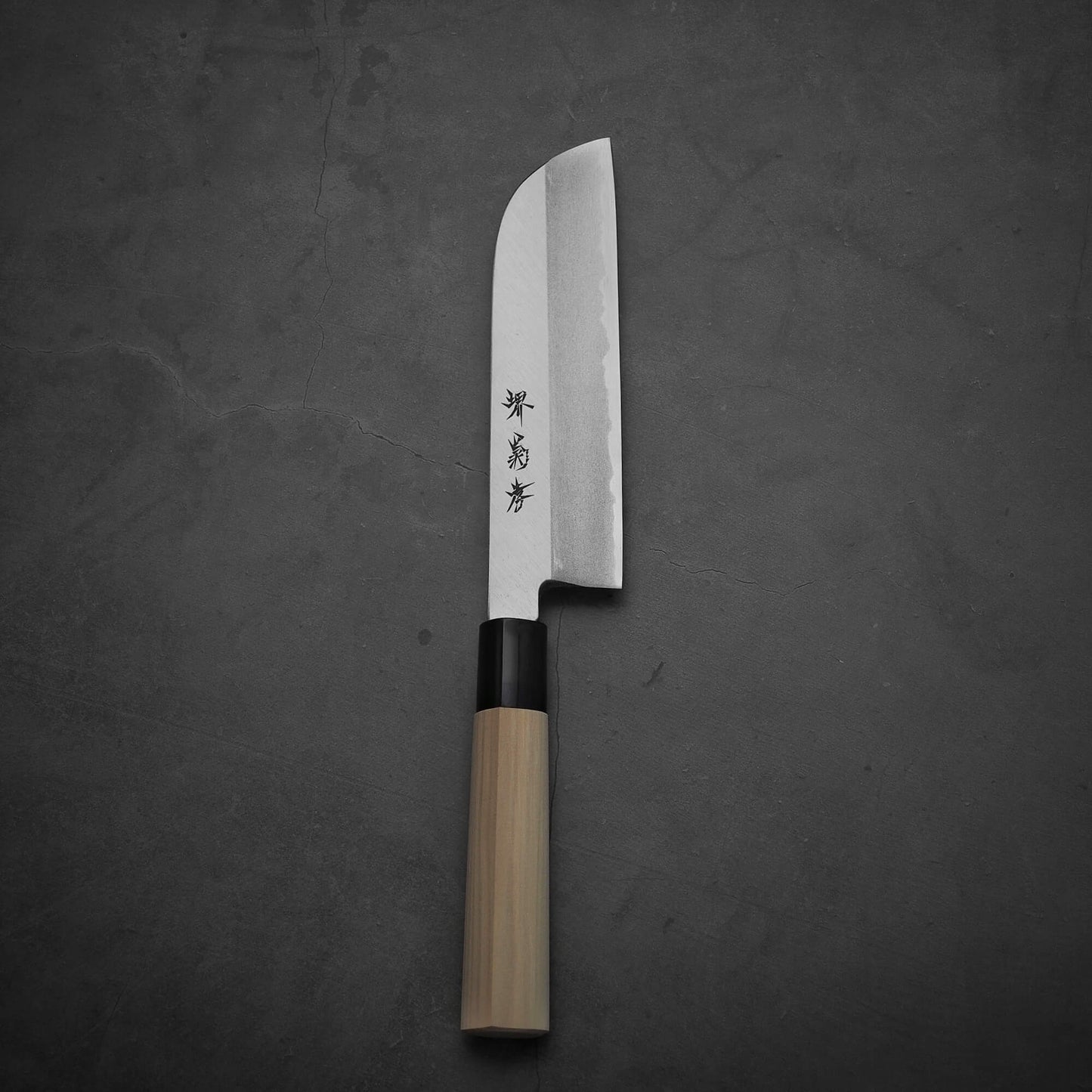 Top view of Sakai Takayuki shirogami#3 kamagata usuba knife in vertical position