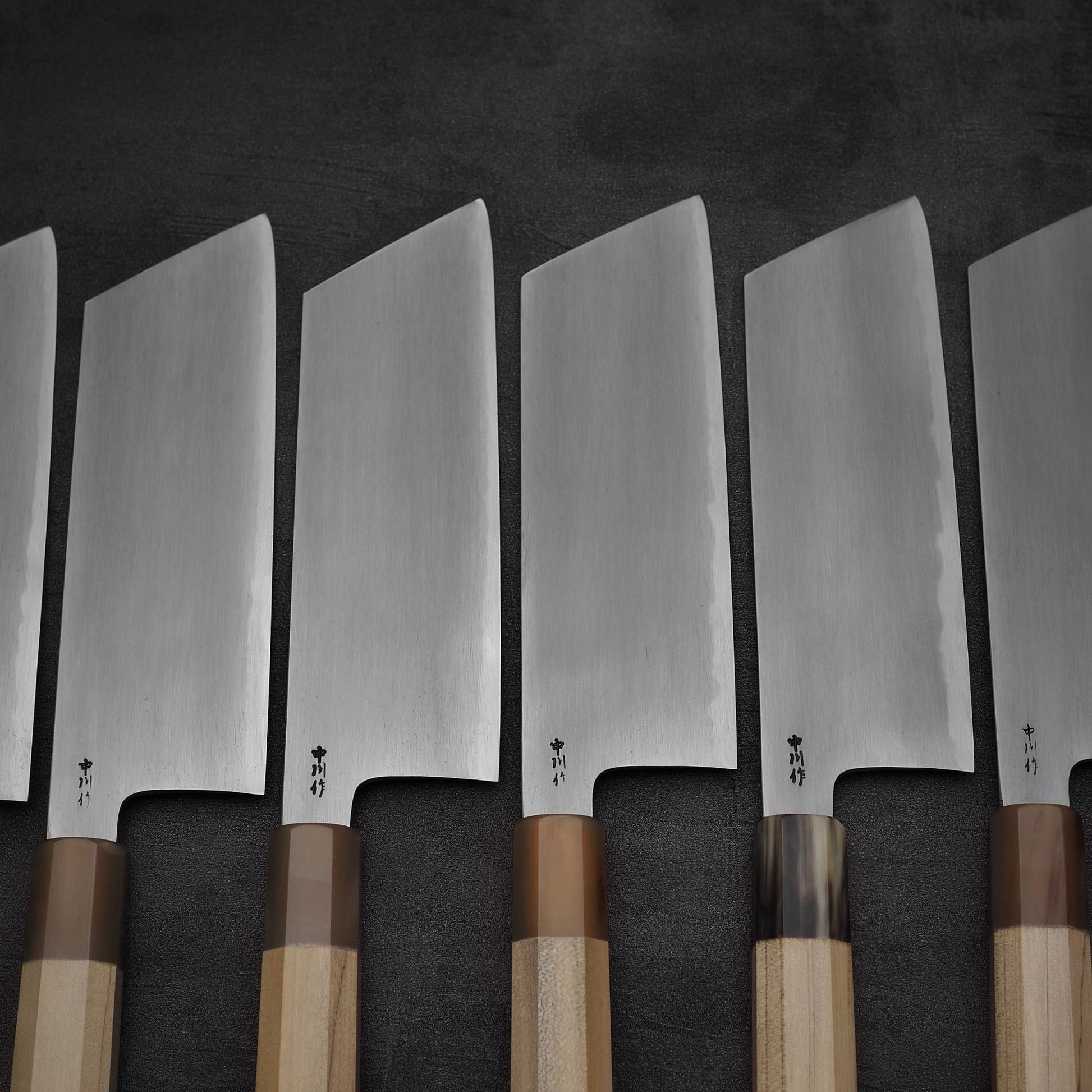 A group photo of multiple Nakagawa bokashi shirogami#1 ktip nakiri knives