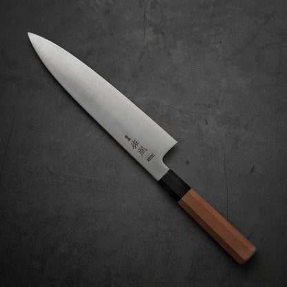 Top view of Sukenari XEOS gyuto 240mm where the pointed tip is facing towards upper left