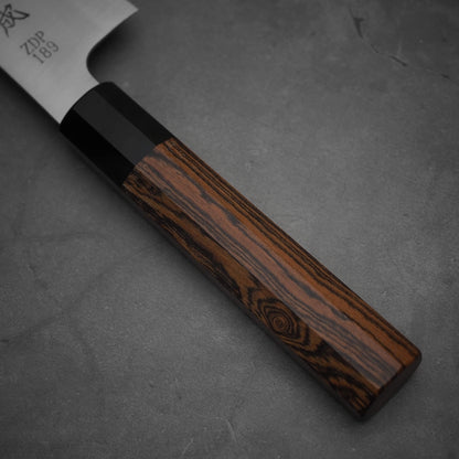 Close up view of the handle of a 210mm Sukenari ZDP189 gyuto knife