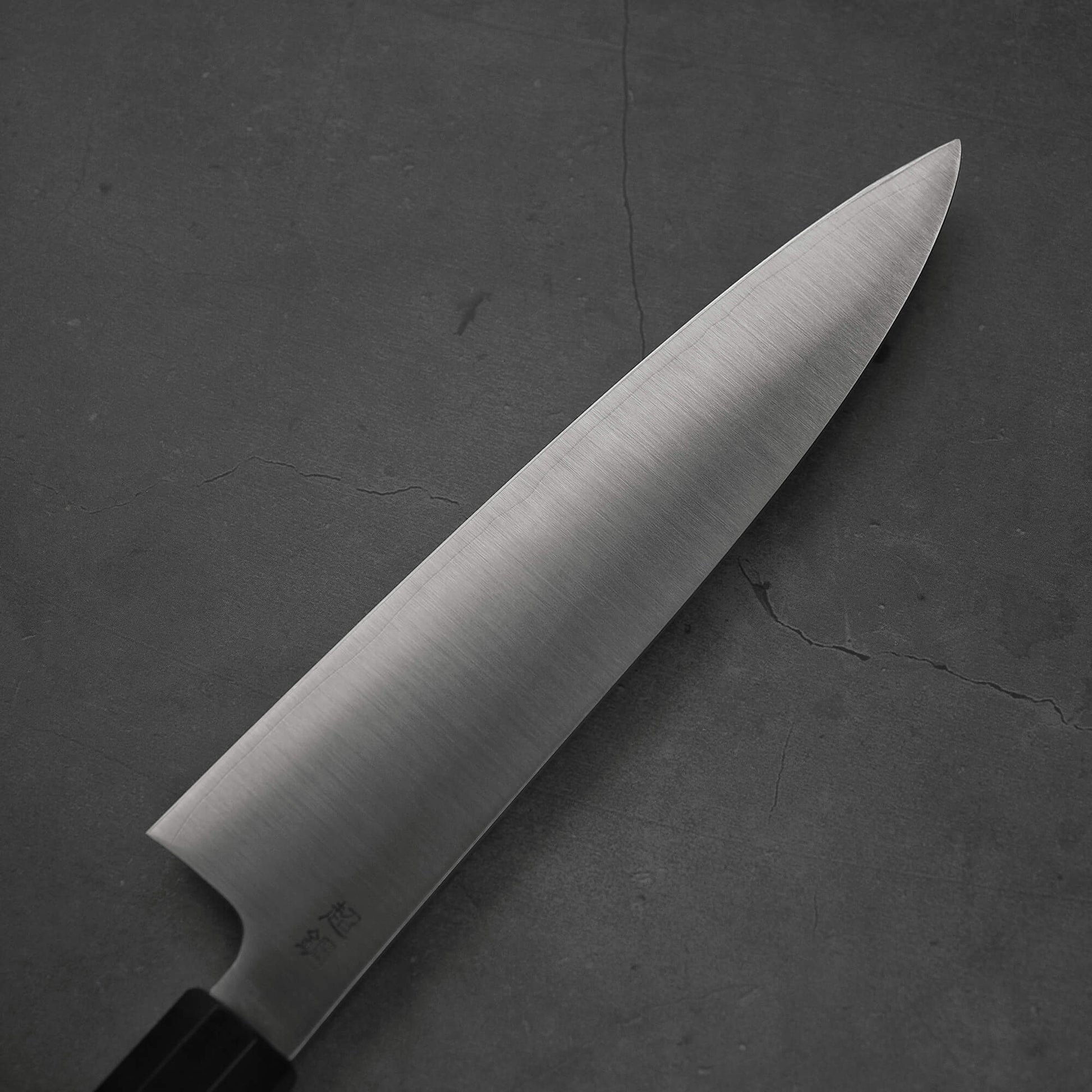 Top view of the back side of 210mm Sukenari ZDP189 gyuto knife. 