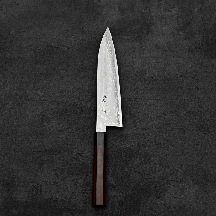 Top down view of Takayuki Iwai aogami#2 damascus 210mm gyuto knife in vertical position