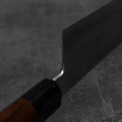 Close up view of the choil polish of Takayuki Iwai aogami#2 damascus 210mm gyuto knife