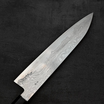 Close up view of Takayuki Iwai aogami#2 damascus 240mm gyuto knife showing the back side