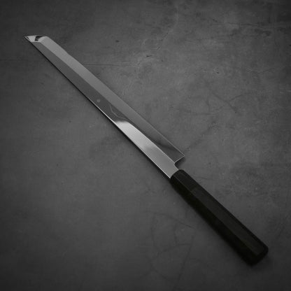 Angled view of Yoshikazu Ikeda honyaki sakimaru takohiki. This hand-forged Japanese knife is made of shirogami#1 steel.