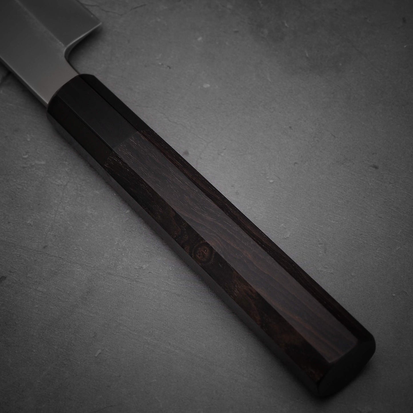 Close up view of the handle of Yoshikazu Ikeda honyaki sakimaru takohiki. This hand-forged Japanese knife is made of shirogami#1 steel.