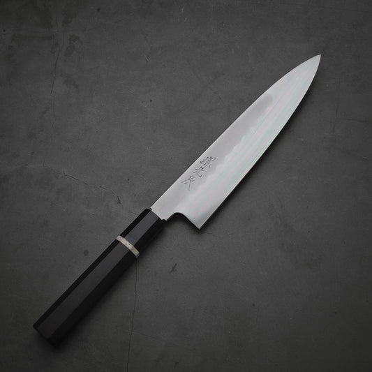 Top down view of Yoshikazu Ikeda honyaki gyuto. This hand-forged Japanese knife is made of shirogami#3 steel.