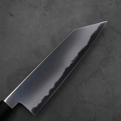Close up view of the blade of Yoshikazu Tanaka AS bunka. This hand-forged Japanese knife is made of aogami super steel.