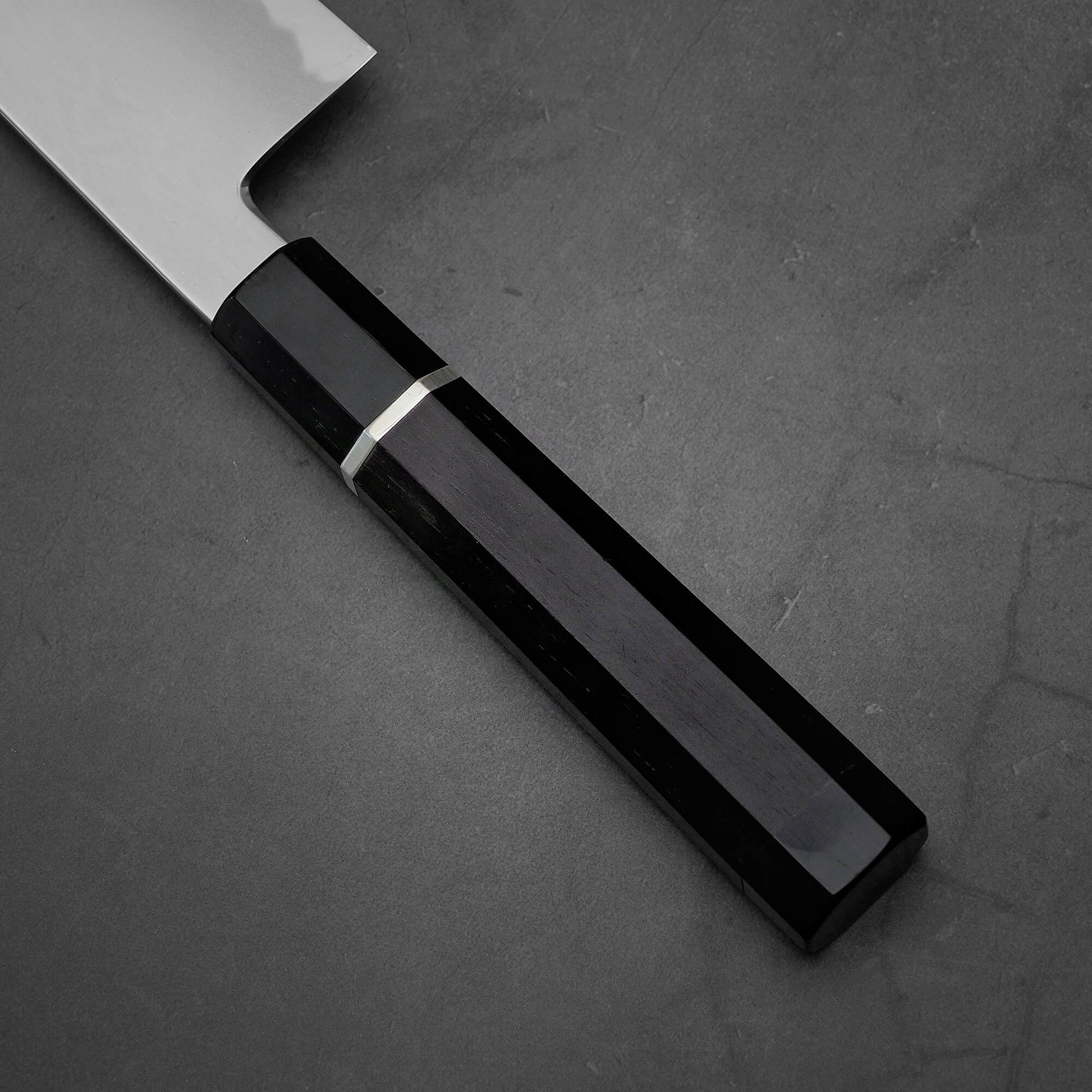 Close up view of Yoshikazu Tanaka AS bunka. This hand-forged Japanese knife is made of aogami super steel.
