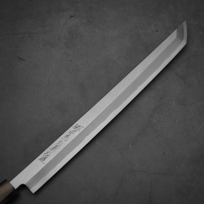 Close up view of Yoshikazu Tanaka sakimaru takohiki knife with a hand-forged blade made of shirogami#2 steel.