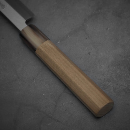 Close up view of the handle of Yoshikazu Tanaka sakimaru takohiki knife with a hand-forged blade made of shirogami#2 steel.