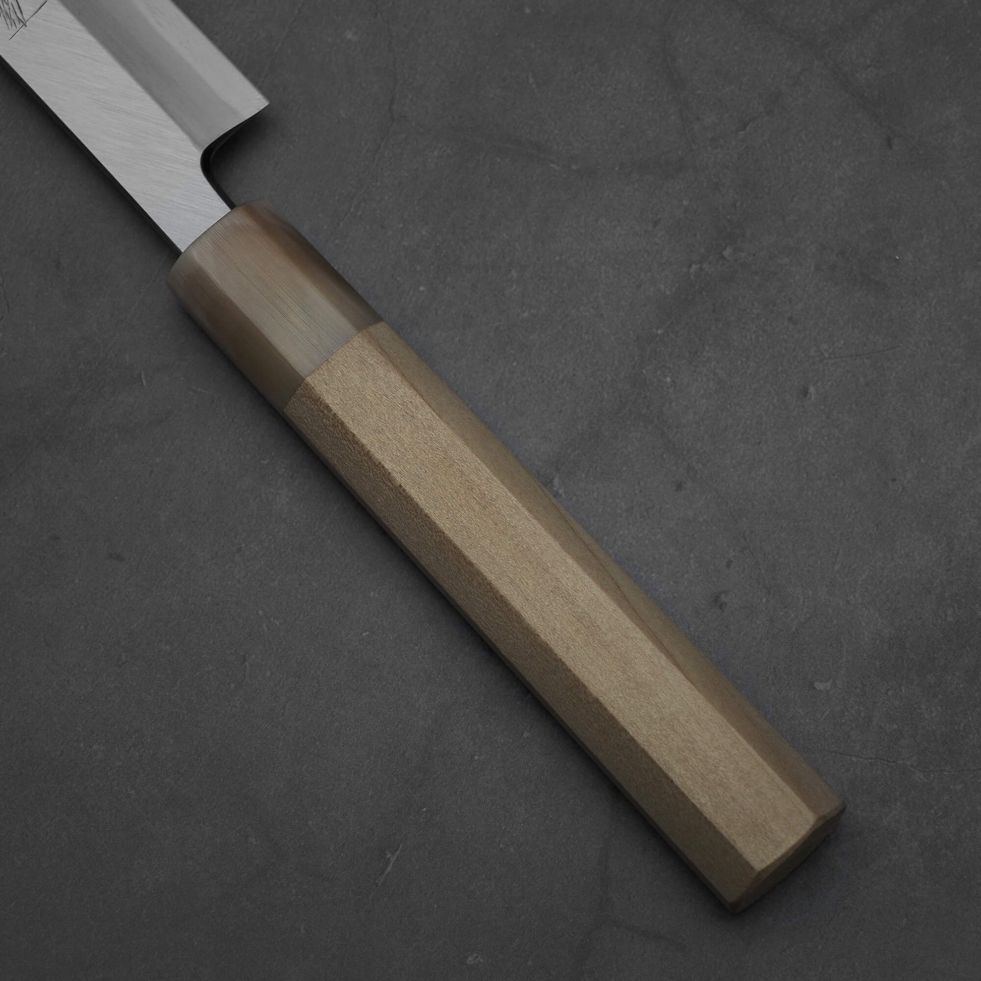 Close up view of Yoshikazu Tanaka 300mm sakimaru takohiki knife with a hand-forged blade made of shirogami#2 steel.
